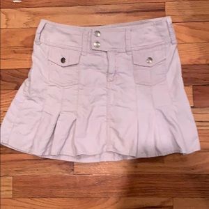 Cream colored corduroy mini pleated skirt